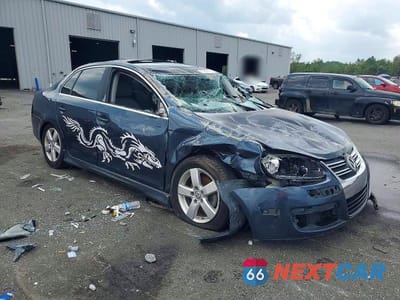 Czwarte zdjęcie samochodu z boku: 2009 VOLKSWAGEN JETTA SE VIN:3VWRM71K39M164774 - miniatura
