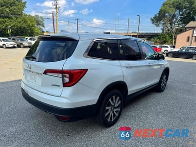 Czwarte zdjęcie samochodu z boku: 2020 HONDA PILOT EXL VIN:5FNYF6H51LB046740 - miniatura