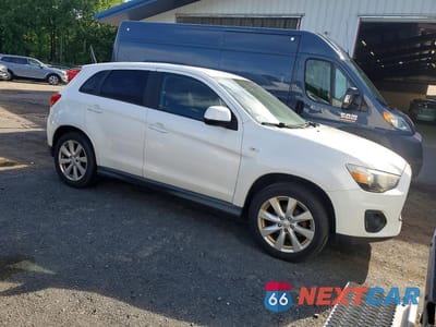 Czwarte zdjęcie samochodu z boku: 2014 MITSUBISHI OUTLANDER SPORT ES VIN:4A4AR3AU2EE003451 - miniatura
