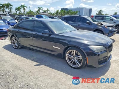 Czwarte zdjęcie samochodu z boku: 2013 BMW 750 LXI VIN:WBAYF8C51DD140108 - miniatura