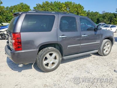 Trzecie zdjęcie samochodu z tyłu: 2011 CHEVROLET TAHOE C1500 LTZ VIN:1GNSCCE01BR132202 - miniatura