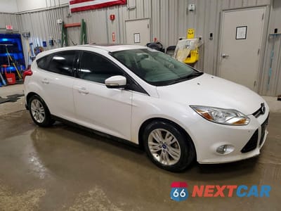 Czwarte zdjęcie samochodu z boku: 2012 FORD FOCUS SEL VIN:1FAHP3M26CL206041 - miniatura
