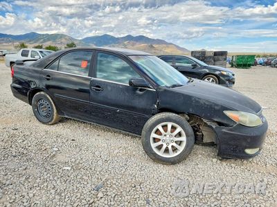 Czwarte zdjęcie samochodu z boku: 2002 TOYOTA CAMRY SE VIN:JTDBE32K220099479 - miniatura