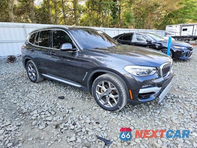 Czwarte zdjęcie samochodu z boku: 2021 BMW X3 XDRIVE30E VIN:5UXTS1C09M9H01258 - miniatura