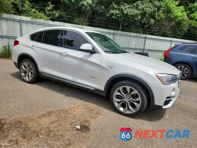 Czwarte zdjęcie samochodu z boku: 2016 BMW X4 XDRIVE35I VIN:5UXXW5C51G0N92194 - miniatura