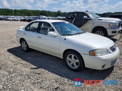 Czwarte zdjęcie samochodu z boku: 2000 NISSAN SENTRA BASE VIN:3N1CB51D6YL333195 - miniatura