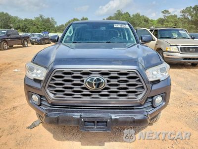 Piąte zdjęcie samochodu w środku: 2020 TOYOTA TACOMA SR5 V6 VIN:3TMDZ5BN5LM089028 - miniatura