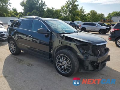 Czwarte zdjęcie samochodu z boku: 2016 CADILLAC SRX PERFORMANCE COLLECTION VIN:3GYFNCE37GS562183 - miniatura