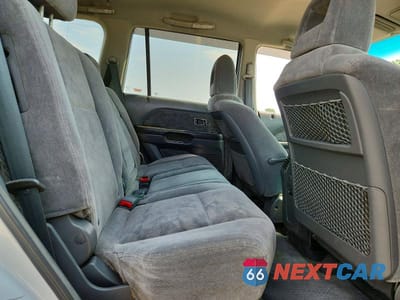 Zdjęcie 11 z 13 samochodu: 2003 HONDA PILOT EX VIN:2HKYF18433H514611 - miniatura