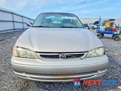 Piąte zdjęcie samochodu w środku: 1999 TOYOTA COROLLA VE VIN:2T1BR12E6XC240148 - miniatura