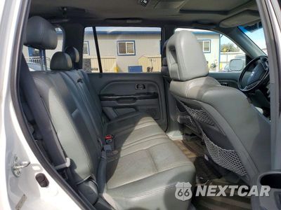 Zdjęcie 11 z 13 samochodu: 2005 HONDA PILOT EXL VIN:2HKYF18625H541917 - miniatura