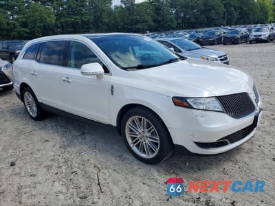 Czwarte zdjęcie samochodu z boku: 2015 LINCOLN MKT VIN:2LMHJ5AT1FBL04175 - miniatura