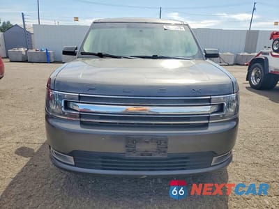 Piąte zdjęcie samochodu w środku: 2016 FORD FLEX SEL VIN:2FMGK5C8XGBA21384 - miniatura