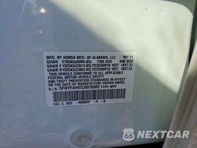 Zdjęcie 13 z 13 samochodu: 2012 HONDA PILOT TOURING VIN:5FNYF4H97CB010302 - miniatura