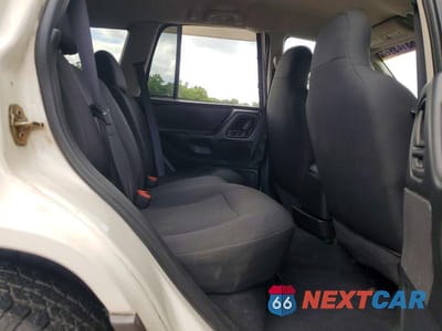 Zdjęcie 11 z 13 samochodu: 2003 JEEP GRAND CHEROKEE LAREDO VIN:1J4GW48SX3C605828 - miniatura