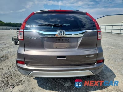 Zdjęcie 6 z 13 samochodu: 2016 HONDA CR-V TOURING VIN:5J6RM3H9XGL016810 - miniatura