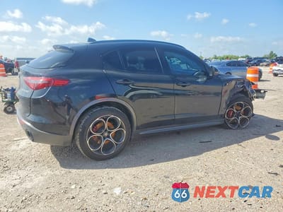Trzecie zdjęcie samochodu z tyłu: 2023 ALFA ROMEO STELVIO TI VIN:ZASPAKBN2P7D50481 - miniatura