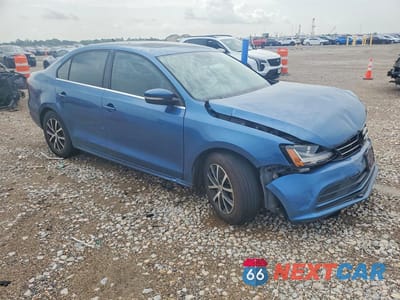 Czwarte zdjęcie samochodu z boku: 2018 VOLKSWAGEN JETTA SE VIN:3VWDB7AJ0JM259319 - miniatura