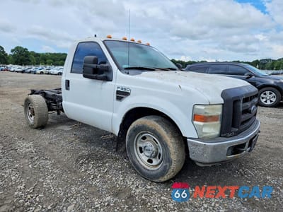Czwarte zdjęcie samochodu z boku: 2010 FORD F350 SUPER DUTY VIN:1FDWF3E58AEA60008 - miniatura