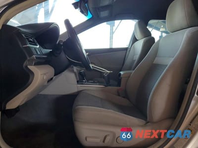 Zdjęcie 7 z 12 samochodu: 2012 TOYOTA CAMRY HYBRID XLE VIN:4T1BD1FK0CU046898 - miniatura