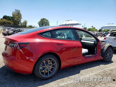 Trzecie zdjęcie samochodu z tyłu: 2021 TESLA MODEL 3 VIN:5YJ3E1EB8MF874313 - miniatura