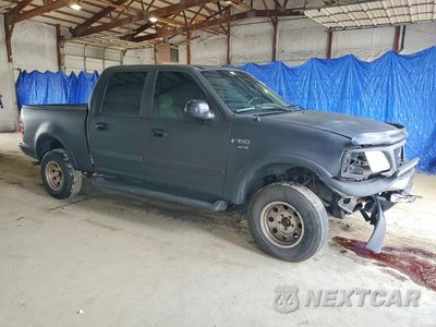 Czwarte zdjęcie samochodu z boku: 2001 FORD F150 SUPERCREW VIN:1FTRW08L71KF90255 - miniatura
