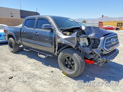 Czwarte zdjęcie samochodu z boku: 2016 TOYOTA TACOMA TRD SPORT VIN:3TMBZ5DN1GM005636 - miniatura
