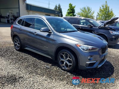 Czwarte zdjęcie samochodu z boku: 2016 BMW X1 XDRIVE28I VIN:WBXHT3C31G5F64616 - miniatura