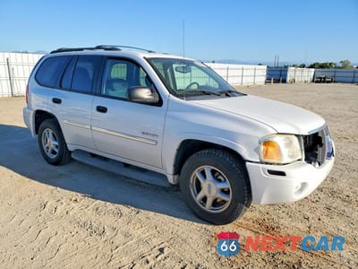 Czwarte zdjęcie samochodu z boku: 2006 GMC ENVOY VIN:1GKDT13S362124745 - miniatura