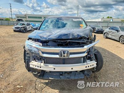 Piąte zdjęcie samochodu w środku: 2020 HONDA PILOT EXL VIN:5FNYF6H5XLB054917 - miniatura