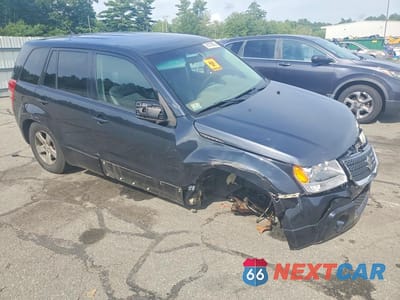 Czwarte zdjęcie samochodu z boku: 2011 SUZUKI GRAND VITARA PREMIUM VIN:JS3TD0D20B4102845 - miniatura