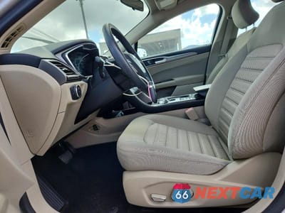 Zdjęcie 7 z 12 samochodu: 2018 FORD FUSION SE HYBRID VIN:3FA6P0LU1JR200896 - miniatura