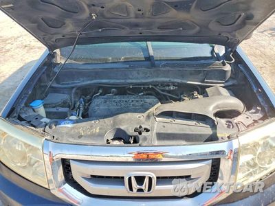 Zdjęcie 12 z 13 samochodu: 2011 HONDA PILOT TOURING VIN:5FNYF4H95BB037688 - miniatura