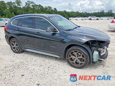 Czwarte zdjęcie samochodu z boku: 2018 BMW X1 SDRIVE28I VIN:WBXHU7C30J5L05298 - miniatura