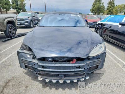 Piąte zdjęcie samochodu w środku: 2015 TESLA MODEL S VIN:5YJSA1E24FF103390 - miniatura