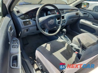 Zdjęcie 8 z 12 samochodu: 2002 MITSUBISHI LANCER ES VIN:JA3AJ26E12U020400 - miniatura