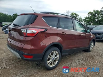 Trzecie zdjęcie samochodu z tyłu: 2018 FORD ESCAPE SE VIN:1FMCU9GD2JUC84395 - miniatura