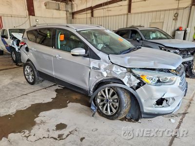 Czwarte zdjęcie samochodu z boku: 2017 FORD ESCAPE TITANIUM VIN:1FMCU9JD2HUD16958 - miniatura