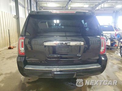 Zdjęcie 6 z 12 samochodu: 2018 GMC YUKON XL DENALI VIN:1GKS2HKJ4JR285357 - miniatura