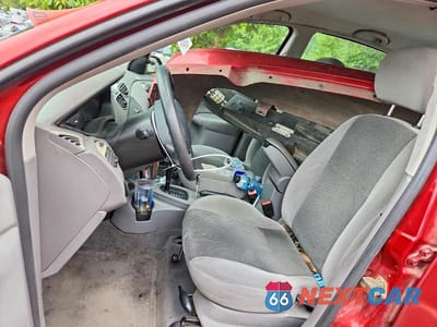 Zdjęcie 7 z 12 samochodu: 2003 FORD FOCUS LX VIN:1FAFP33Z83W302984 - miniatura