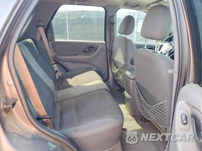 Zdjęcie 10 z 12 samochodu: 2002 FORD ESCAPE XLT VIN:1FMCU03142KC07919 - miniatura