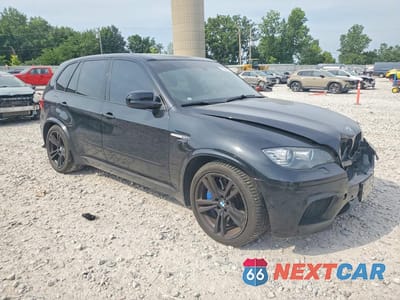 Czwarte zdjęcie samochodu z boku: 2011 BMW X5 M VIN:5YMGY0C53BLK26475 - miniatura