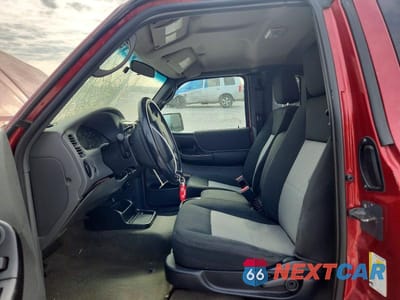 Zdjęcie 7 z 13 samochodu: 2011 FORD RANGER SUPER CAB VIN:1FTLR4FE6BPB04760 - miniatura