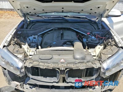 Zdjęcie 12 z 13 samochodu: 2015 BMW X5 XDRIVE35I VIN:5UXKR0C59F0K55467 - miniatura
