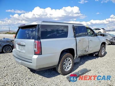 Trzecie zdjęcie samochodu z tyłu: 2019 GMC YUKON XL VIN:1GKS2GKC9KR351754 - miniatura