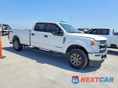 Czwarte zdjęcie samochodu z boku: 2022 FORD F250 SUPER DUTY VIN:1FT7W2BT6NEE21666 - miniatura