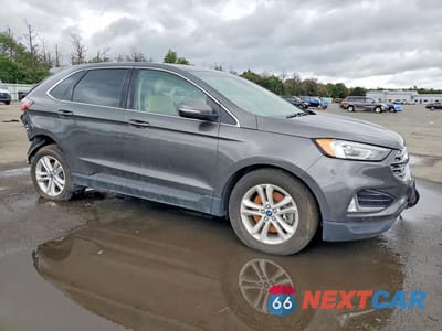 Czwarte zdjęcie samochodu z boku: 2019 FORD EDGE SEL VIN:2FMPK4J99KBC31358 - miniatura