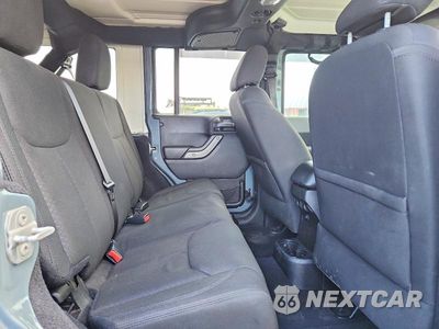 Zdjęcie 11 z 13 samochodu: 2015 JEEP WRANGLER UNLIMITED SPORT VIN:1C4BJWDG7FL773524 - miniatura