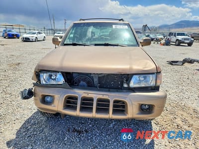 Piąte zdjęcie samochodu w środku: 2000 ISUZU RODEO S VIN:4S2DM58W8Y4326455 - miniatura