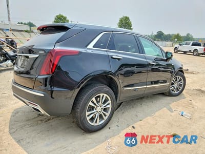 Trzecie zdjęcie samochodu z tyłu: 2021 CADILLAC XT5 PREMIUM LUXURY VIN:1GYKNCRS9MZ151222 - miniatura